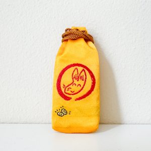 於菊稲荷神社の授与品、福福ちゃんが描かれた黄色い印鑑袋